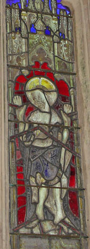 Enlarged portion of stained glass window in St. Michael's church at Cadbury